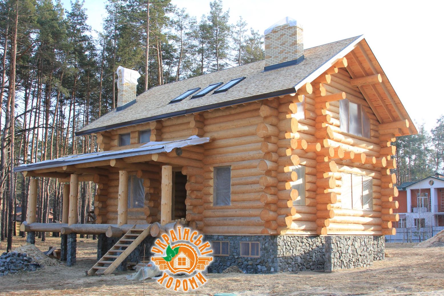 Деревянный коттедж ручной рубки