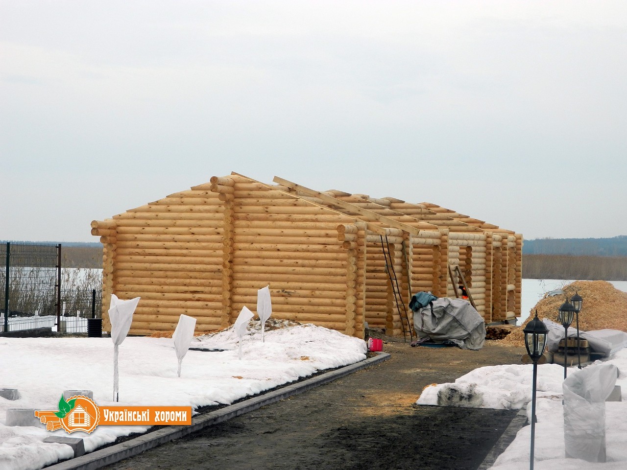 Постройка дома из бревна зимой Постройка дома из бревна зимой